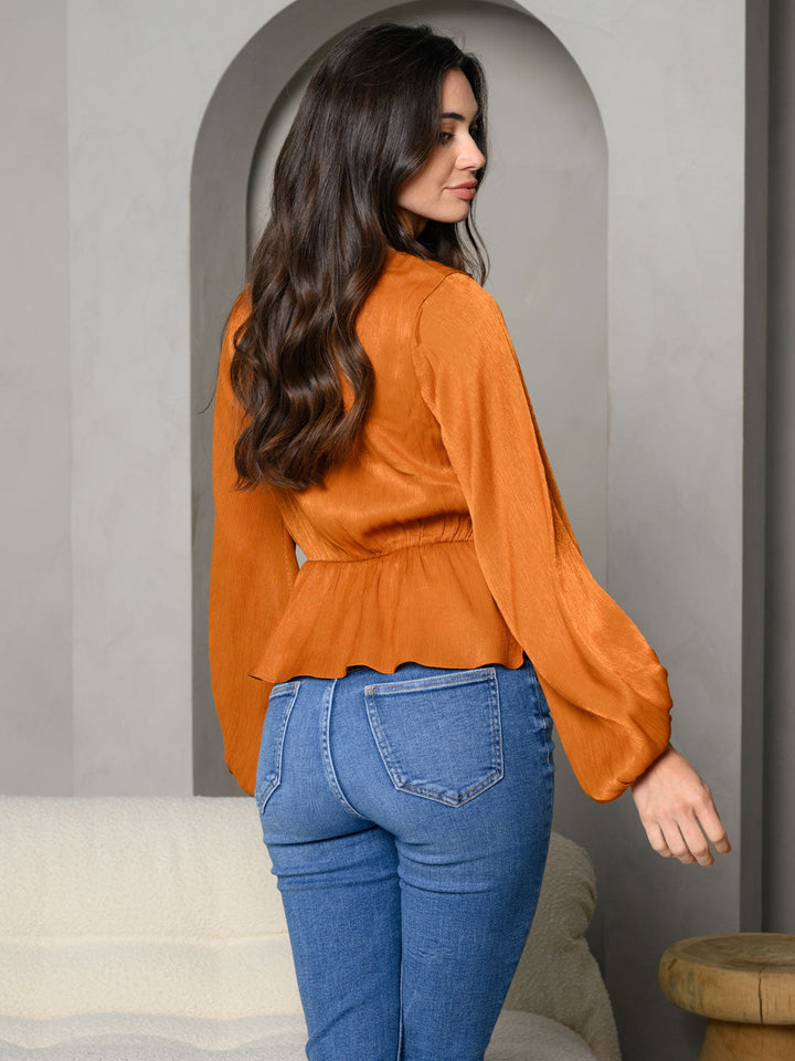 WOMEN'S SURPLICE PEPLUM V-NECK LONG SLEEVE TOP