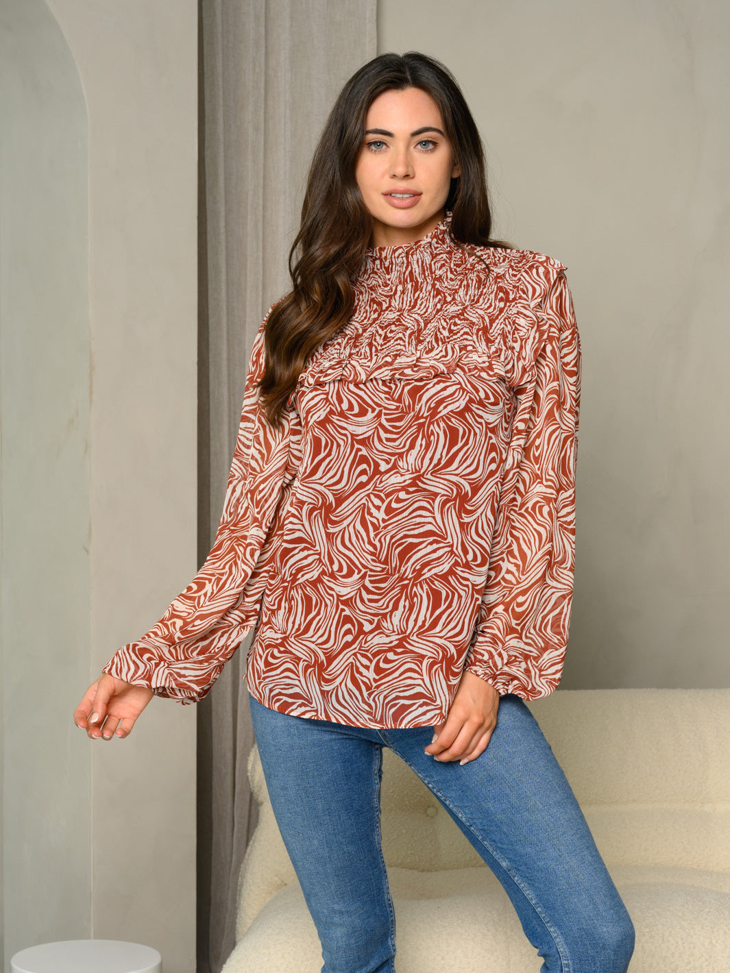 WOMEN'S ANIMAL PRINT SMOCKED FRONT LONG SLEEVE TOP